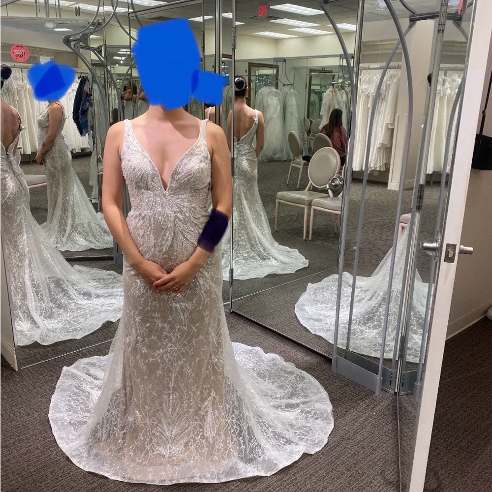 Never been worn wedding dress from David’s bridal